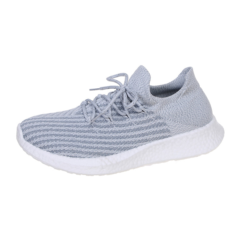 Gray fly-knit running sneakers with lace-up design