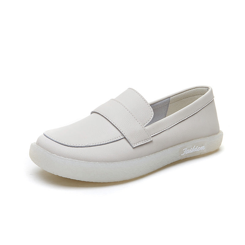 A white slip-on casual loafer with a minimalist design, featuring a strap detail and the word "Fashion" embossed on the sole